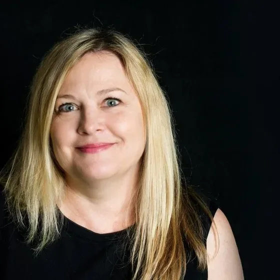 Headshot of Johnette Beutel, CFO / COO