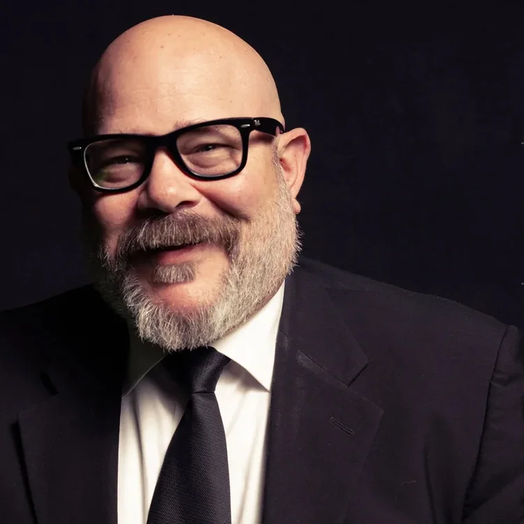 Headshot of Dan Llana, Sr. Account Director